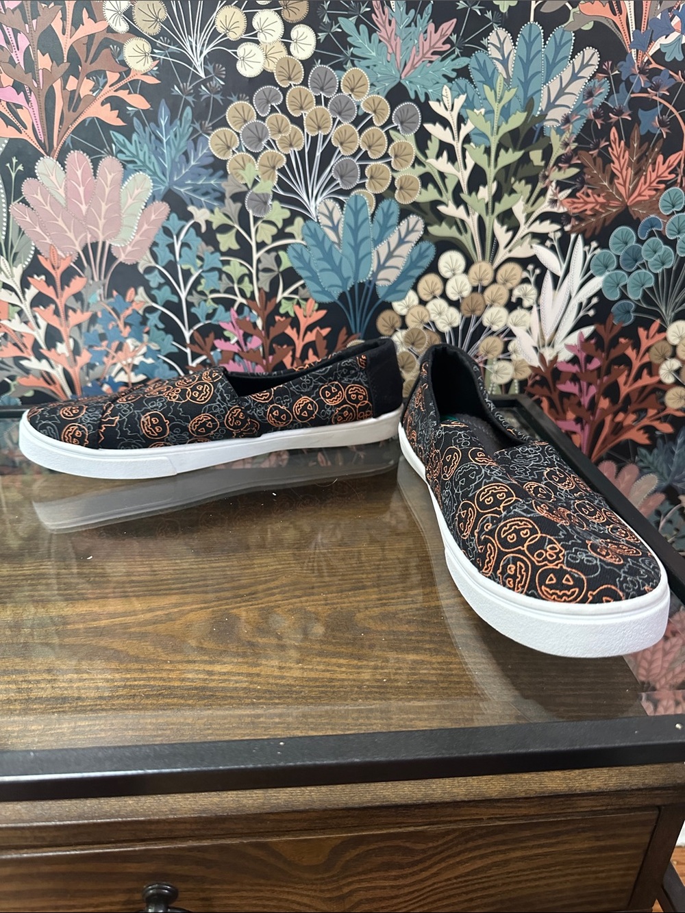 Black Slip-On Sneakers with Orange Pumpkin Pattern
